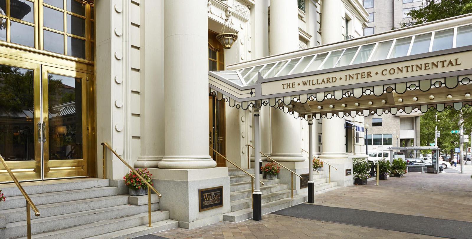 Discover the grand lobby of The Willard InterContinental, Washington, D.C. and its coffered ceilings, Corinthian columns, rare mosaic floors, brass chandeliers, and intricate woodwork.